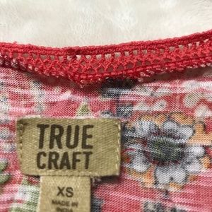 Junior’s sleeveless blouse